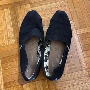 Black toms slip ons